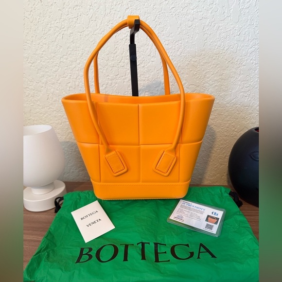 Bottega Veneta Handbags - BOTTEGA VENETA
Rubber Maxi Intrecciato Mini
Arco Tangerine New